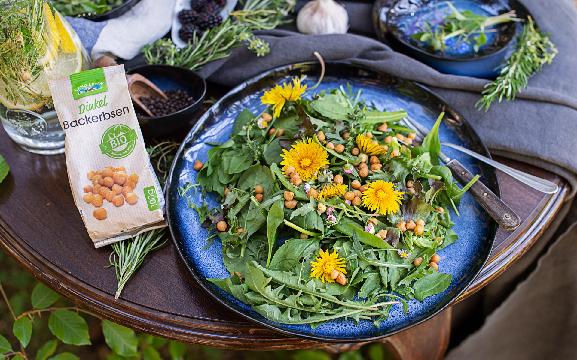 Salad with wild herbs and edible flowers