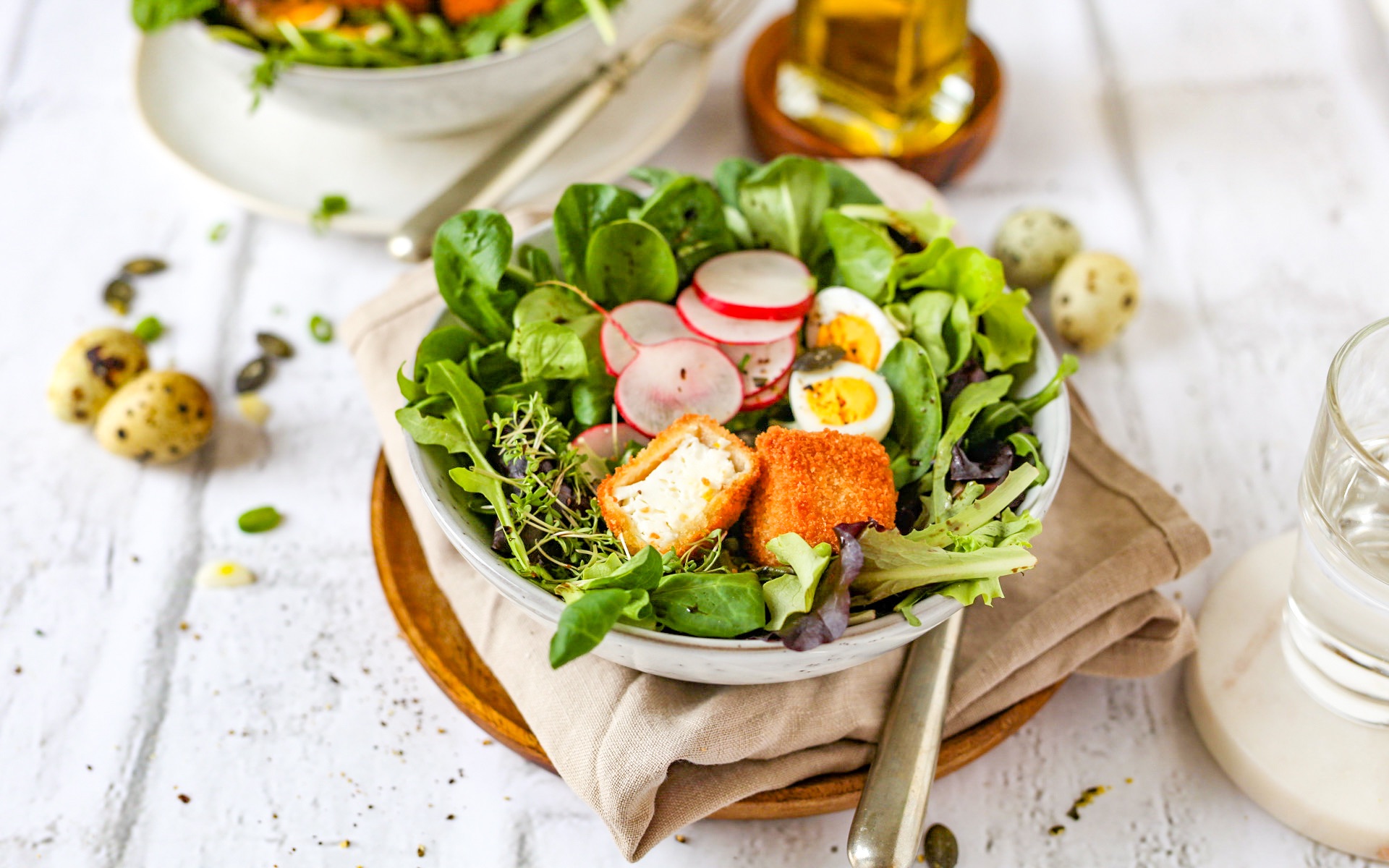 Crispy feta cubes on lettuce